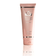 Femme en rose docciaschiuma ri